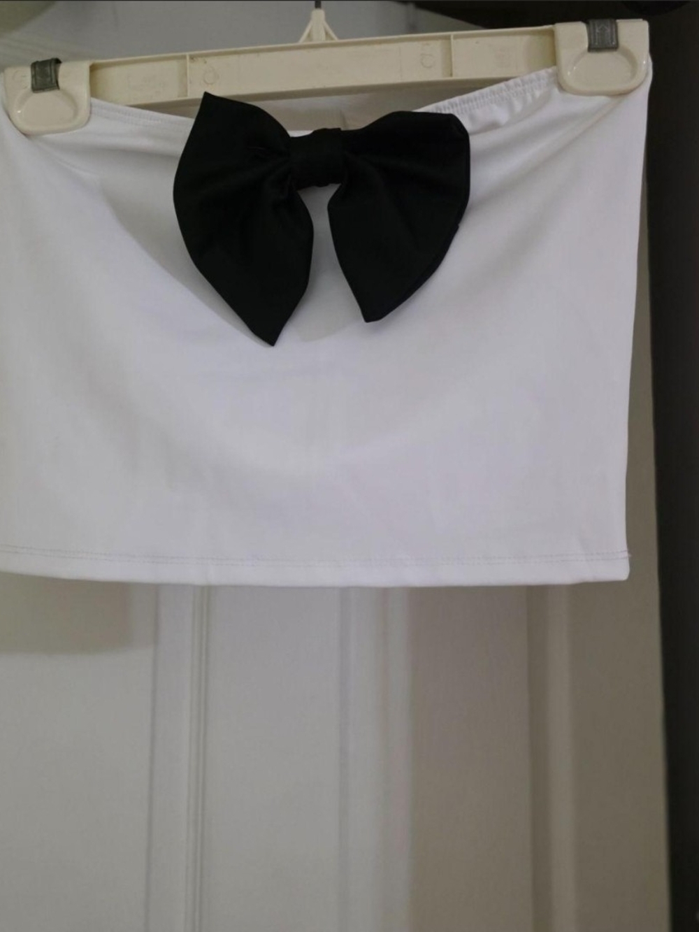 Fashion Nova White Strapless Tube Top with Black Bow Accent